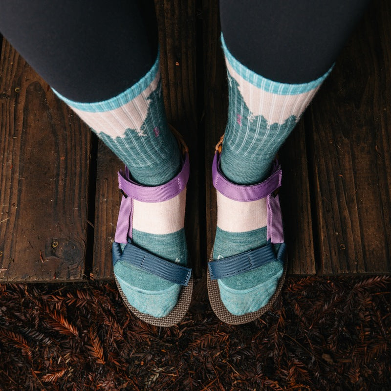 Bird's eye shot of someone in Darn Tough Bear Town Socks and sandals