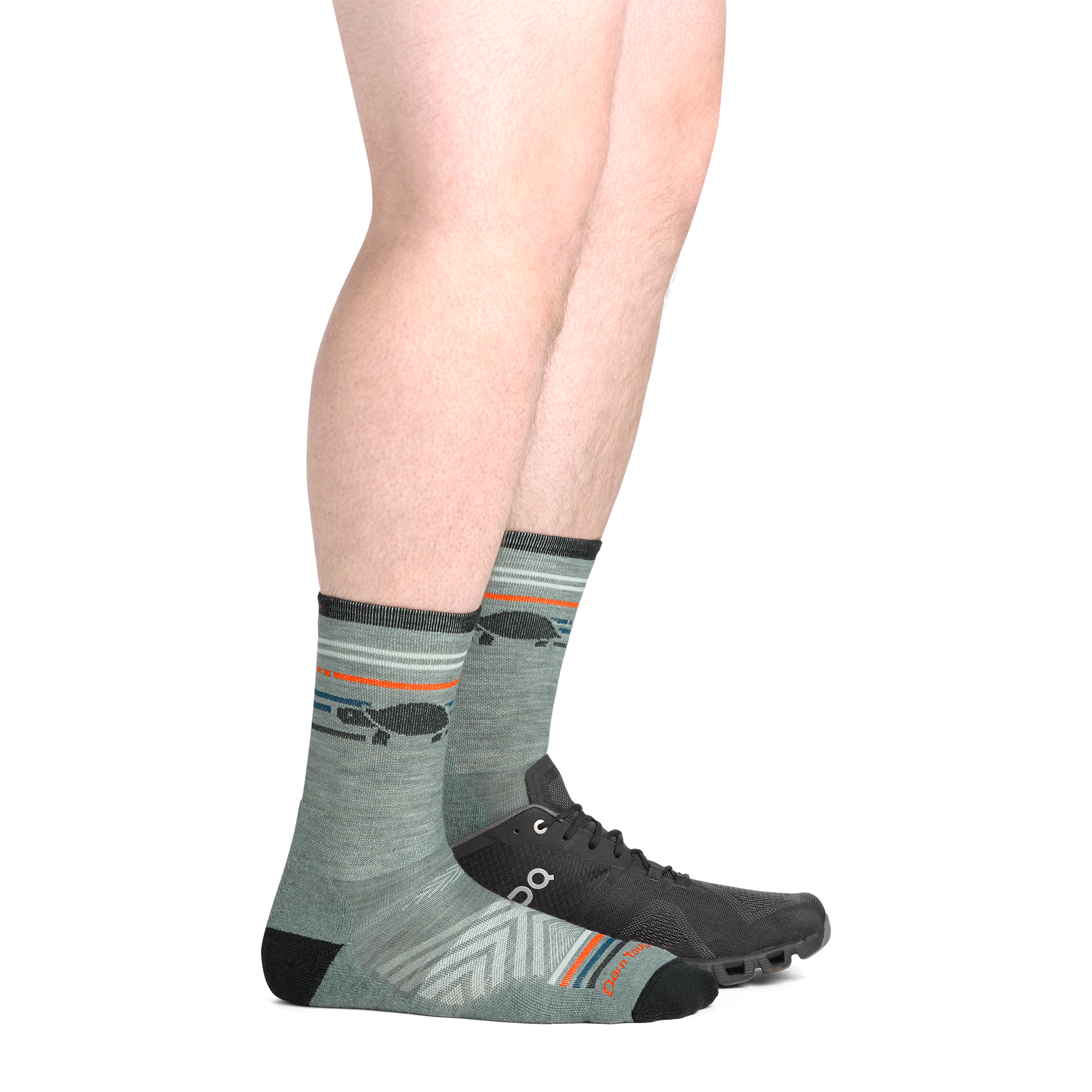 on model image from side view with back foot in a shoe wear the 1041 pacer micro crew sock in seafoam colorway