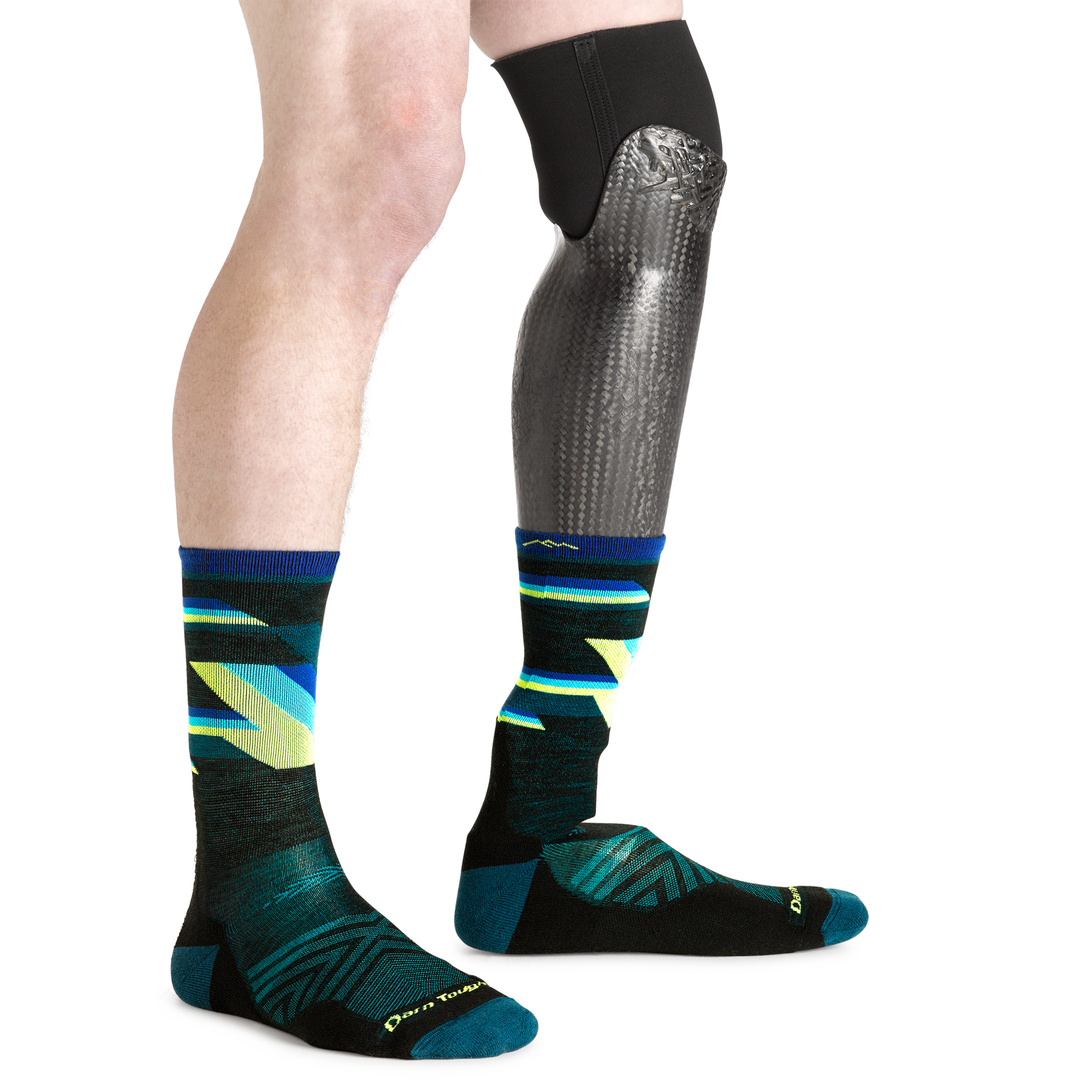 1056 men's bolt micro crew running socks in black on model with prosthetic leg