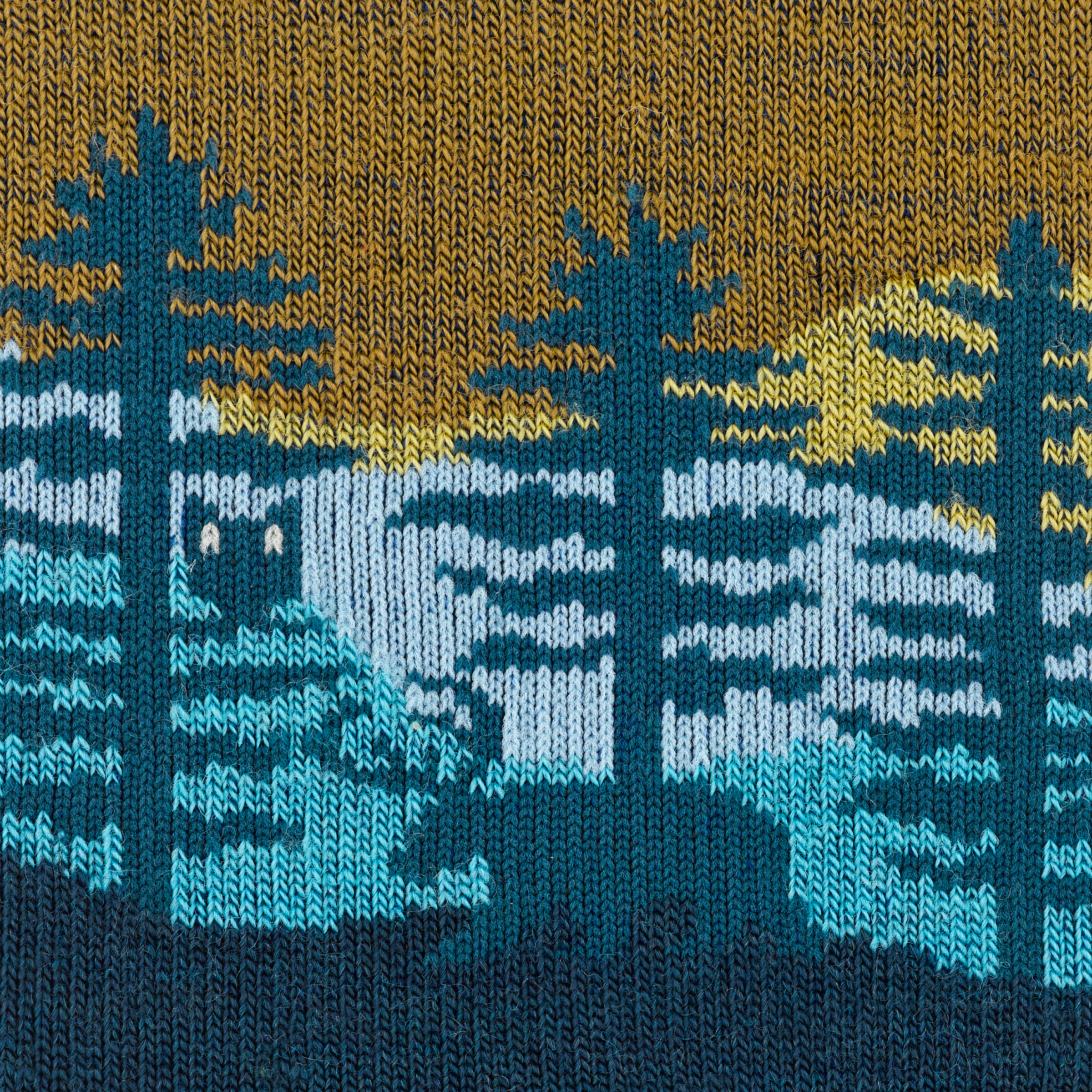 Call out detail image of the of the 5013 Dark Teal front image of the forest with an owl and moose