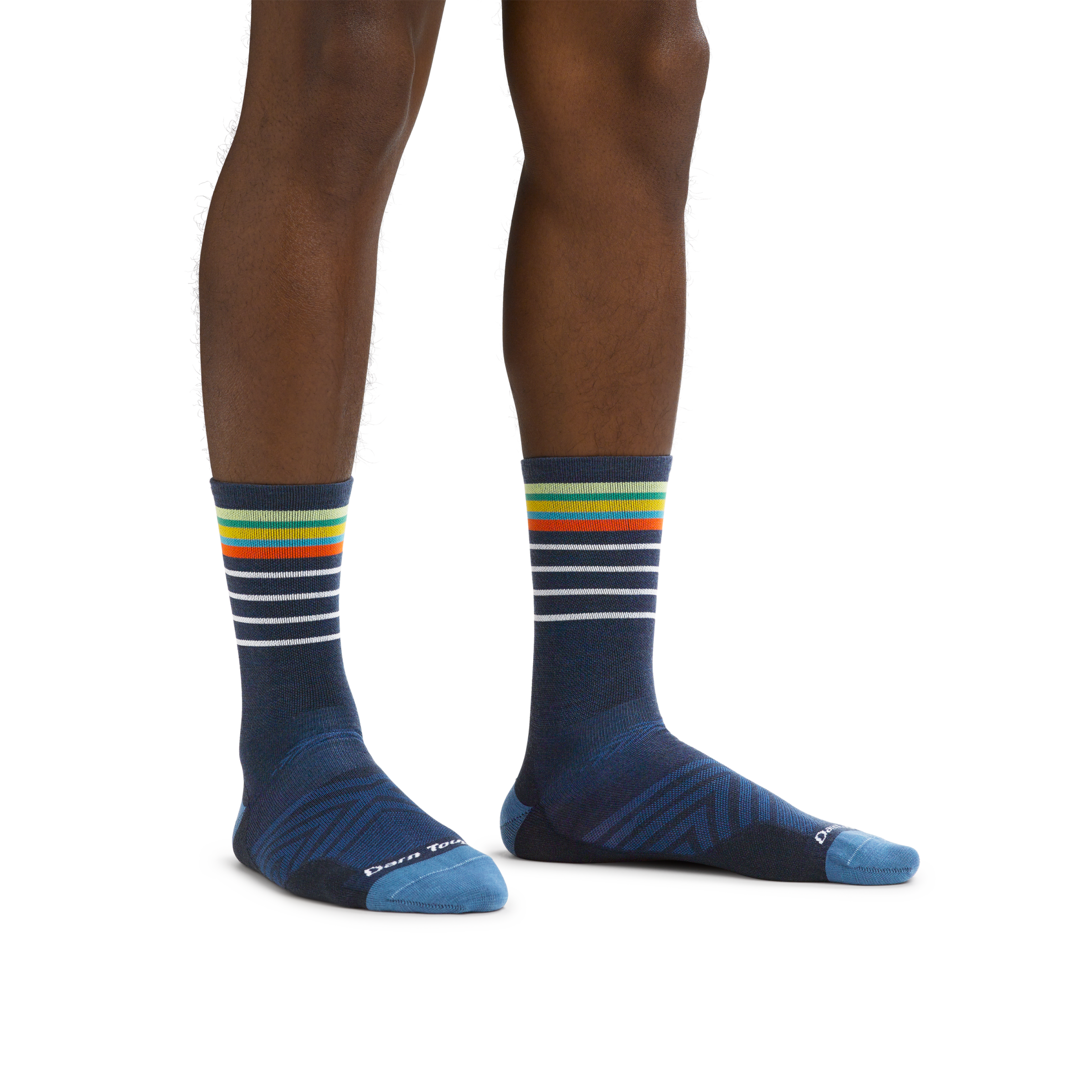 Man standing barefoot wearing Stride Micro Crew Ultra-Lightweight Running Socks in Eclipse