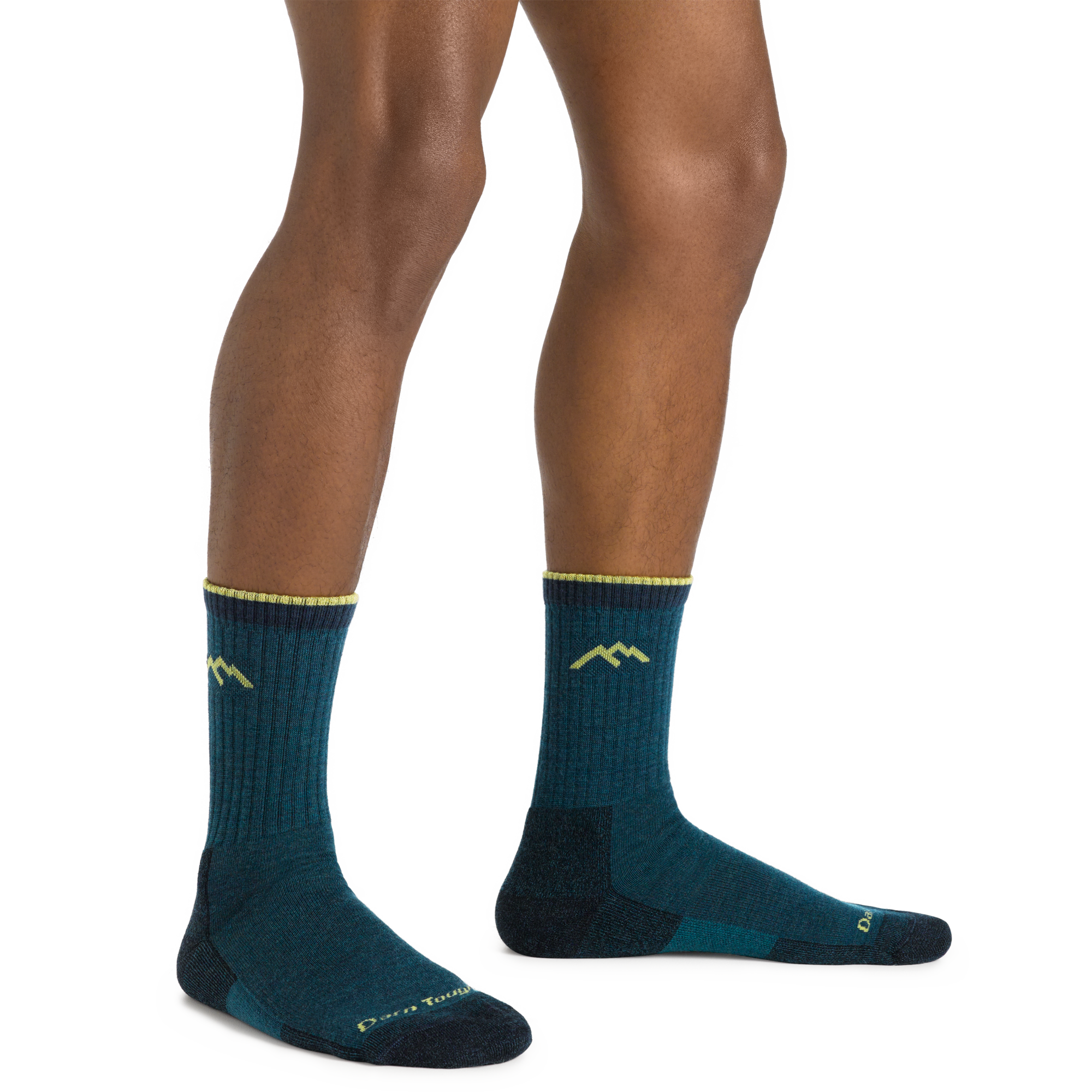 Man standing barefoot wearing Hiker Micro Crew Midweight Hiking Sock in Dark Teal