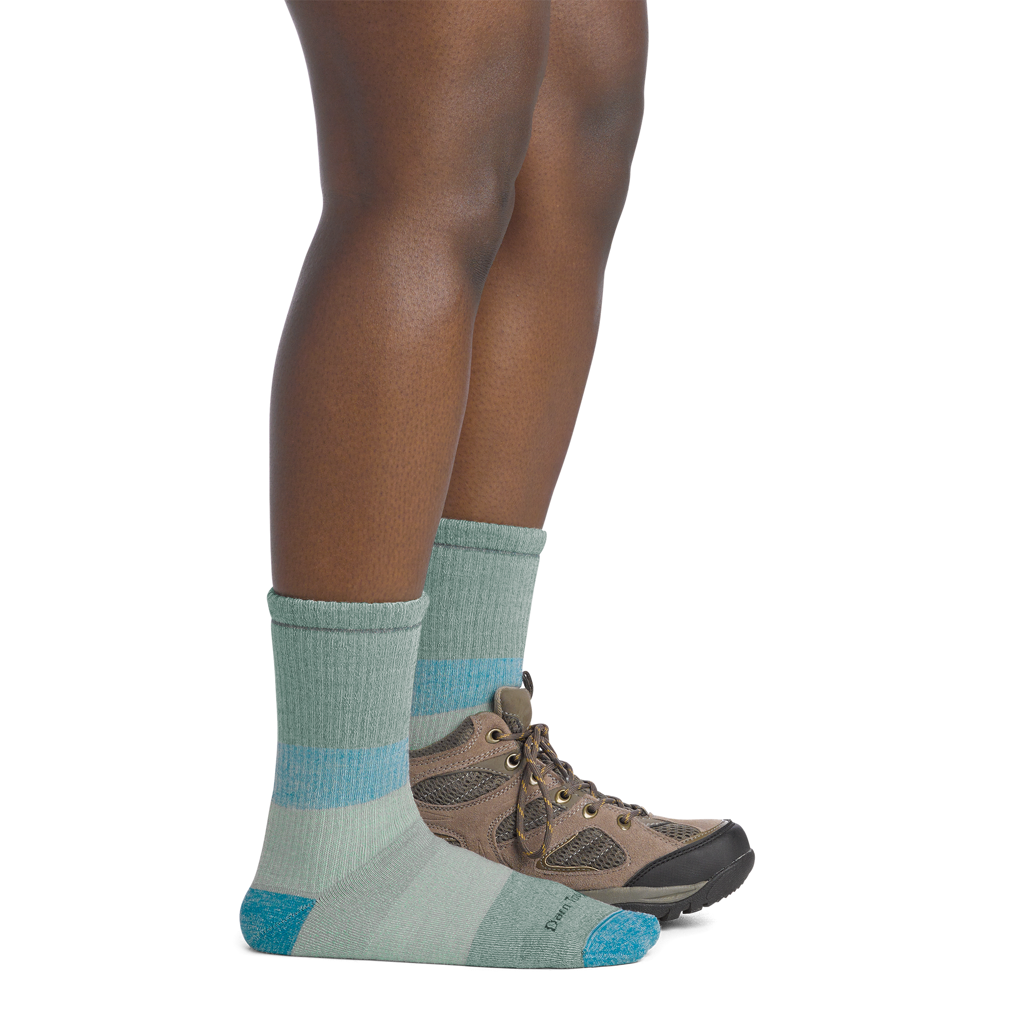on  model image side view back foot in shoe wearing the 5011 micro crew mountaineering sock in reed colorway