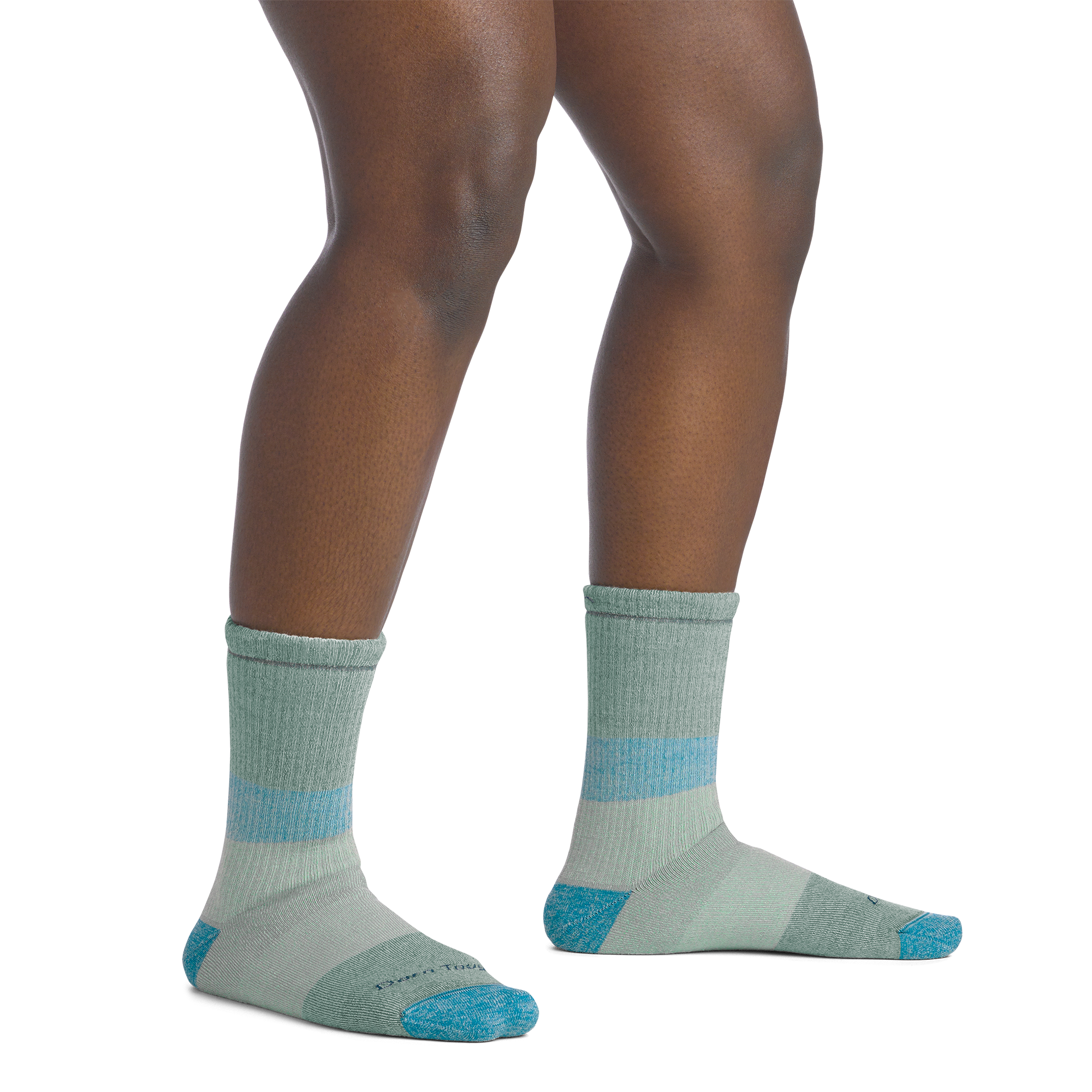 on model image bare foot wearing the 5011 micro crew mountaineering sock in reed colorway