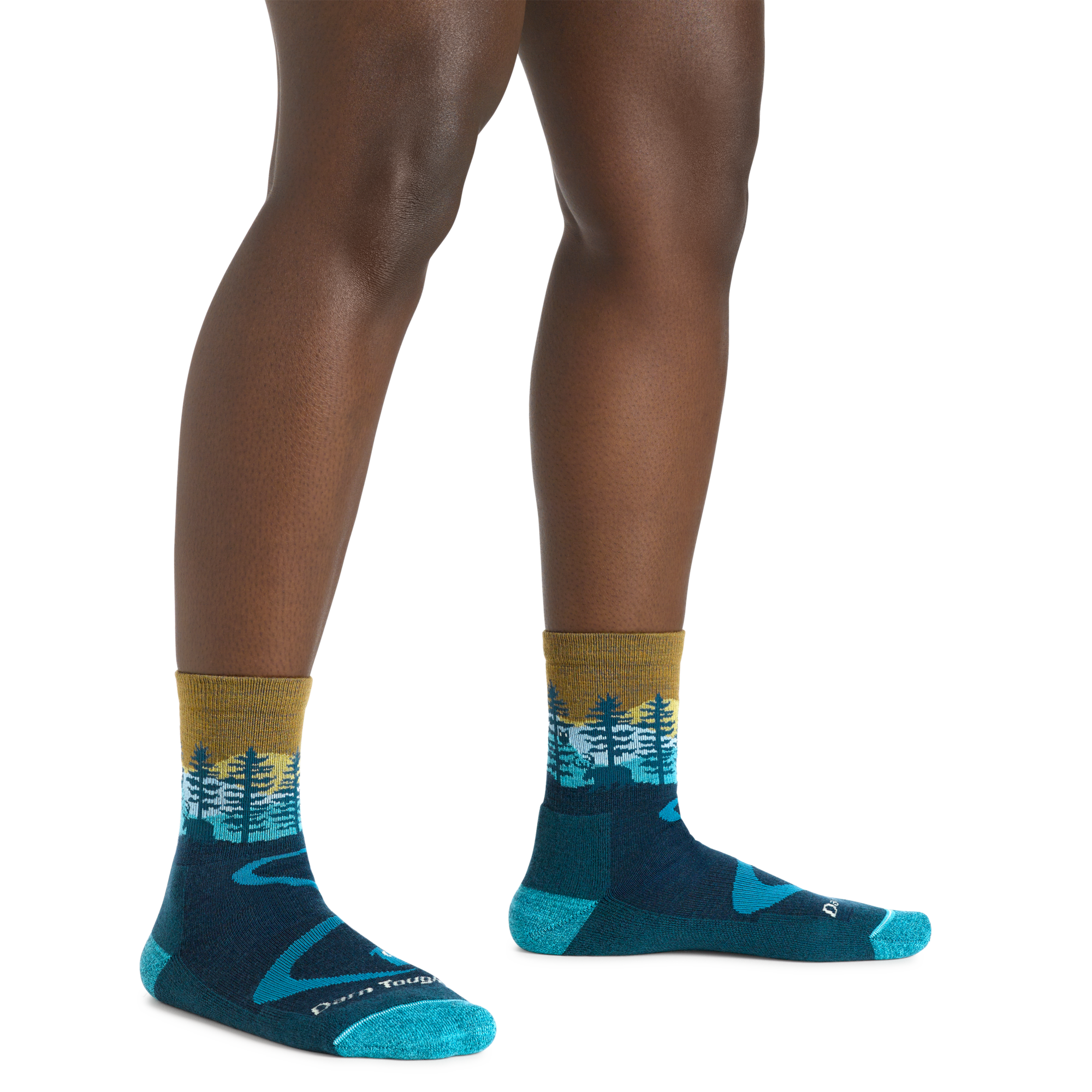 Image of a woman's legs, , wearing Women's Northwoods Micro Crew Midweight Hiking Socks in Dark Teal with the moose showing