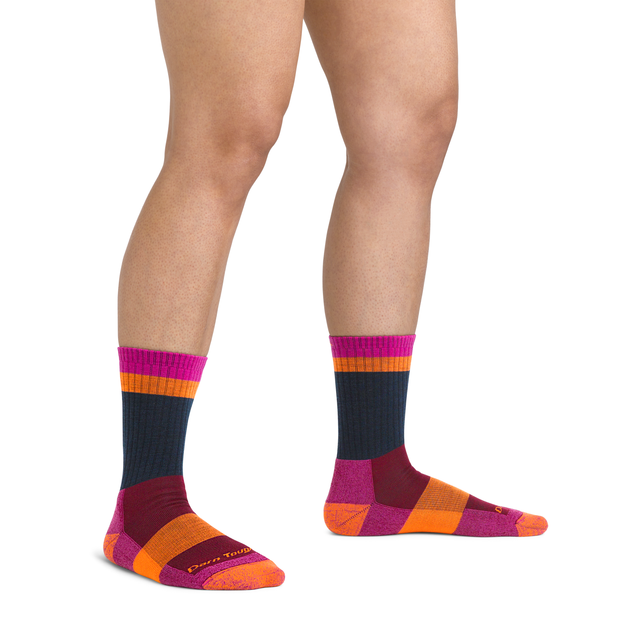 On model image of 5018 Heady Betty Hiking Socks in Clover colorway featuring pink, purple, orange, and navy accents