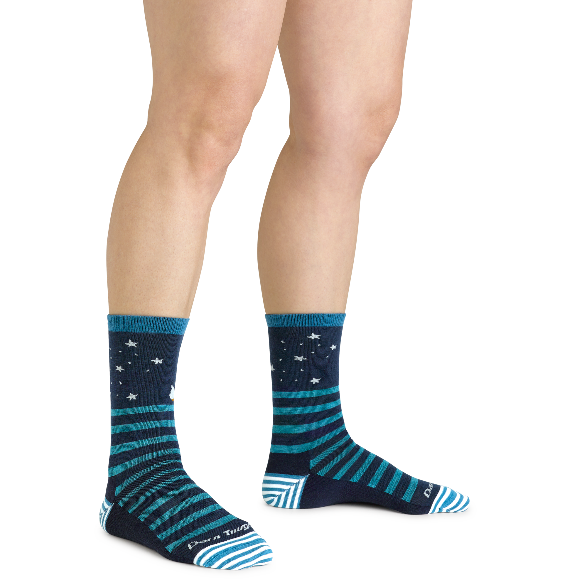 Close up shot of model wearing the women's animal haus crew lifestyle sock in eclipse with no shoes on