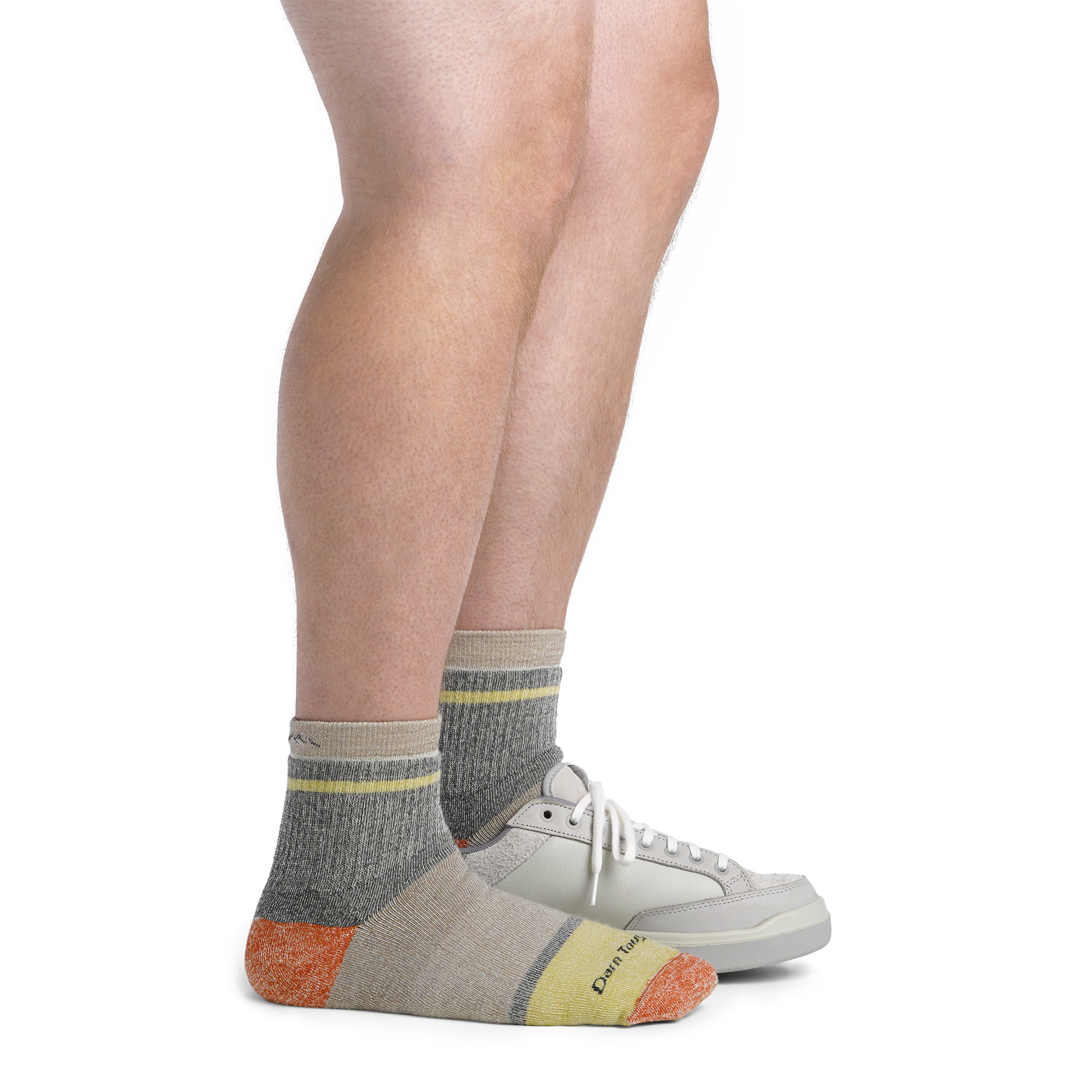 Image of model wearing 6118 Men's Home Base socks and a gray sneaker on one foot