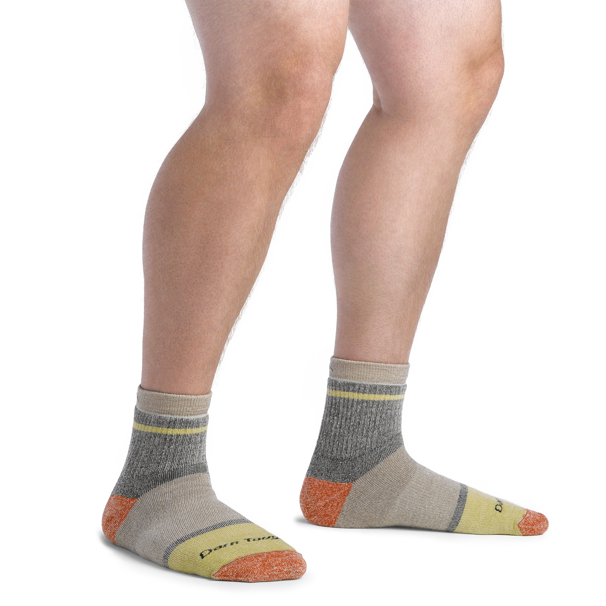 On model image of 6118 Men's Home Base socks in Rye colorway featuring tan, yellow, and orange accents