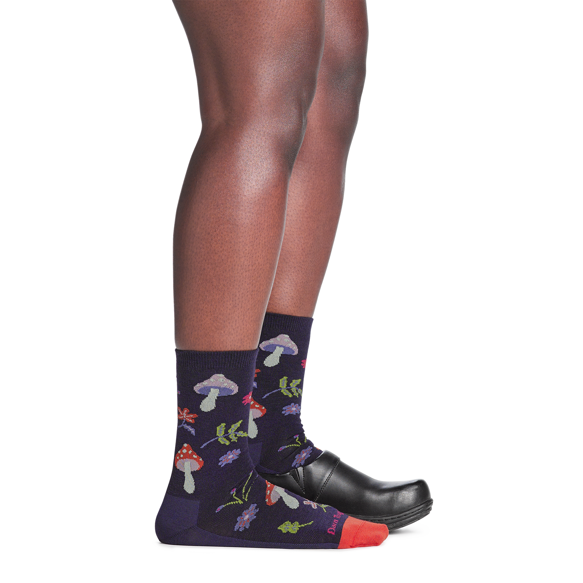 on model image back foot in clog wearing the 6133 shroom bloom lifestyle crew sock in blackberry colorway
