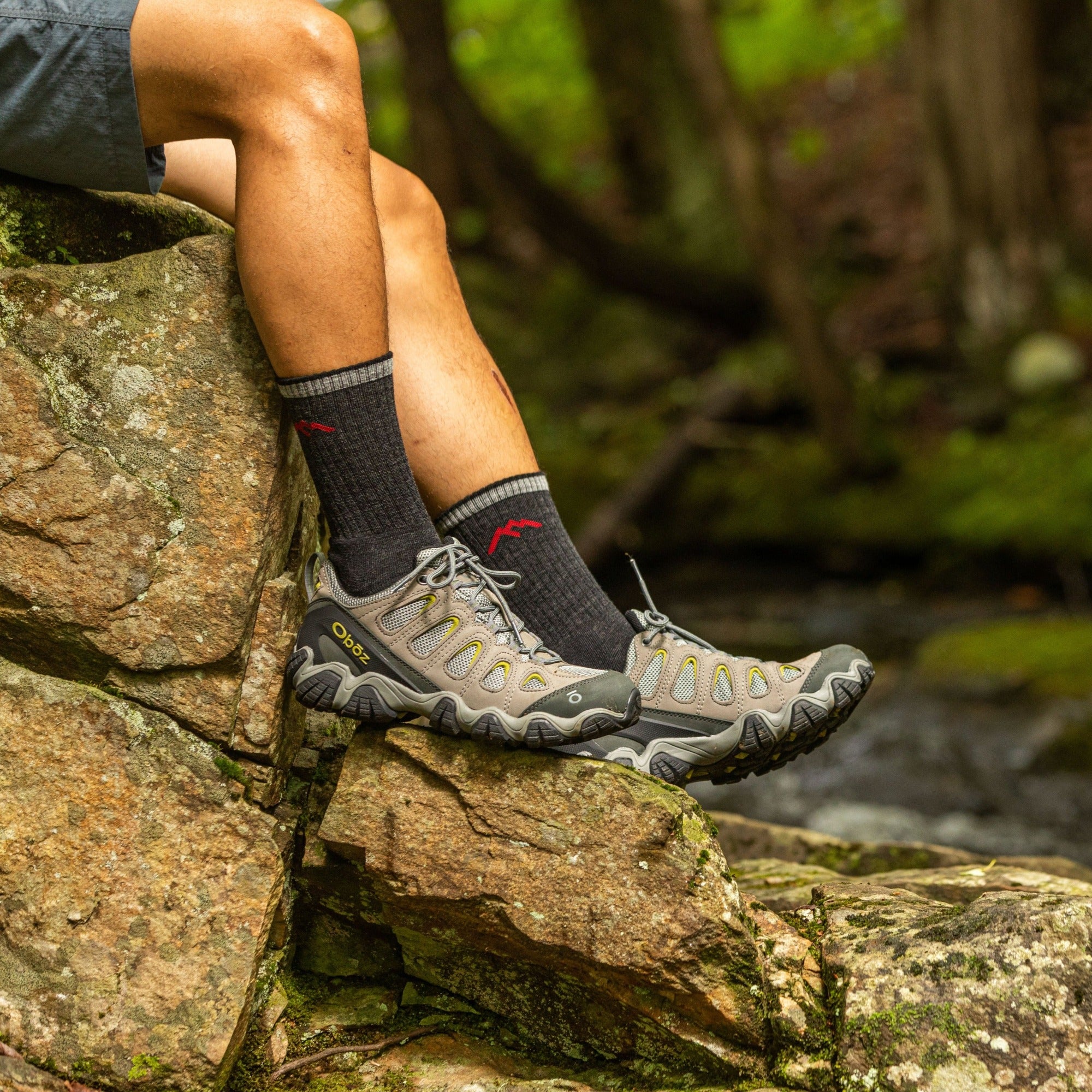 Man outside wearing Hiker Micro Crew Cushion Black Hiking Socks