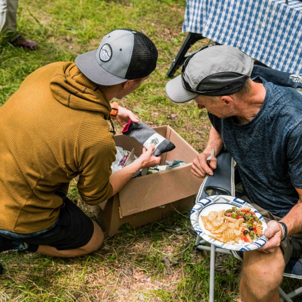 Darn Tough employee giving out socks and food to thru hikers on the Appalachian Trail