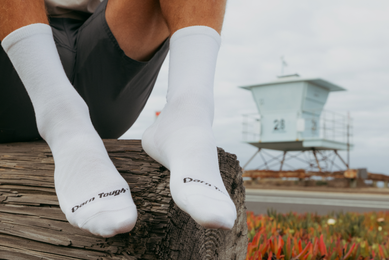 Shop White Socks - feet wearing white crew height socks