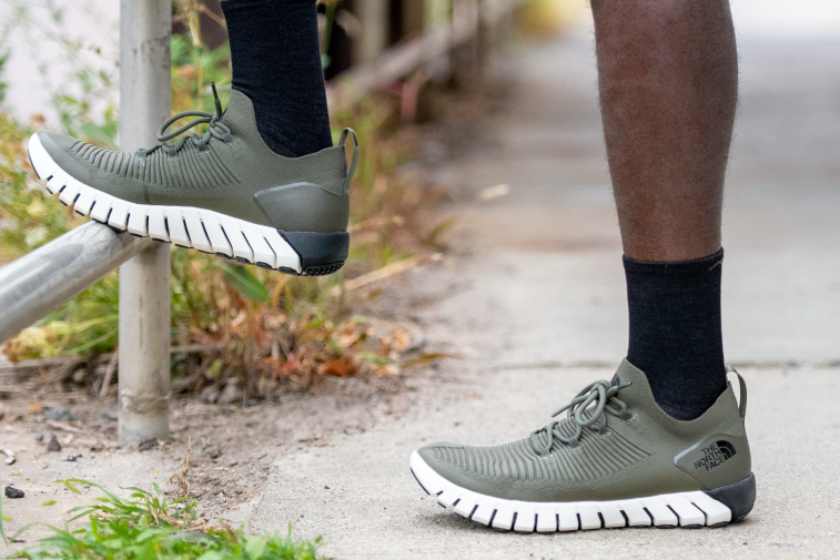 Shop Black Socks - feet wearing crew height black running socks
